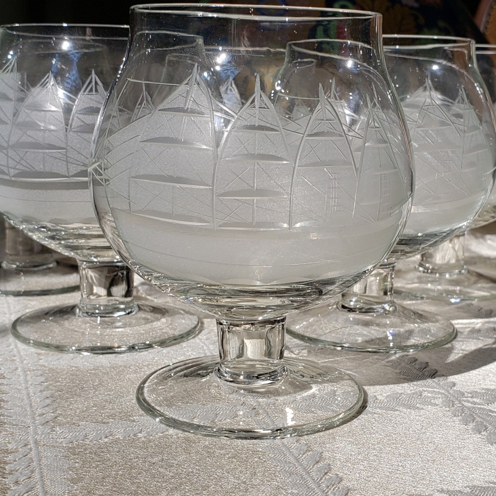 Tall ship etched brandy snifters.